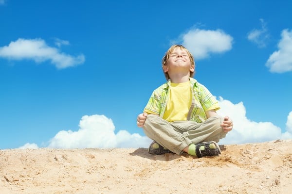 kid practicing meditation